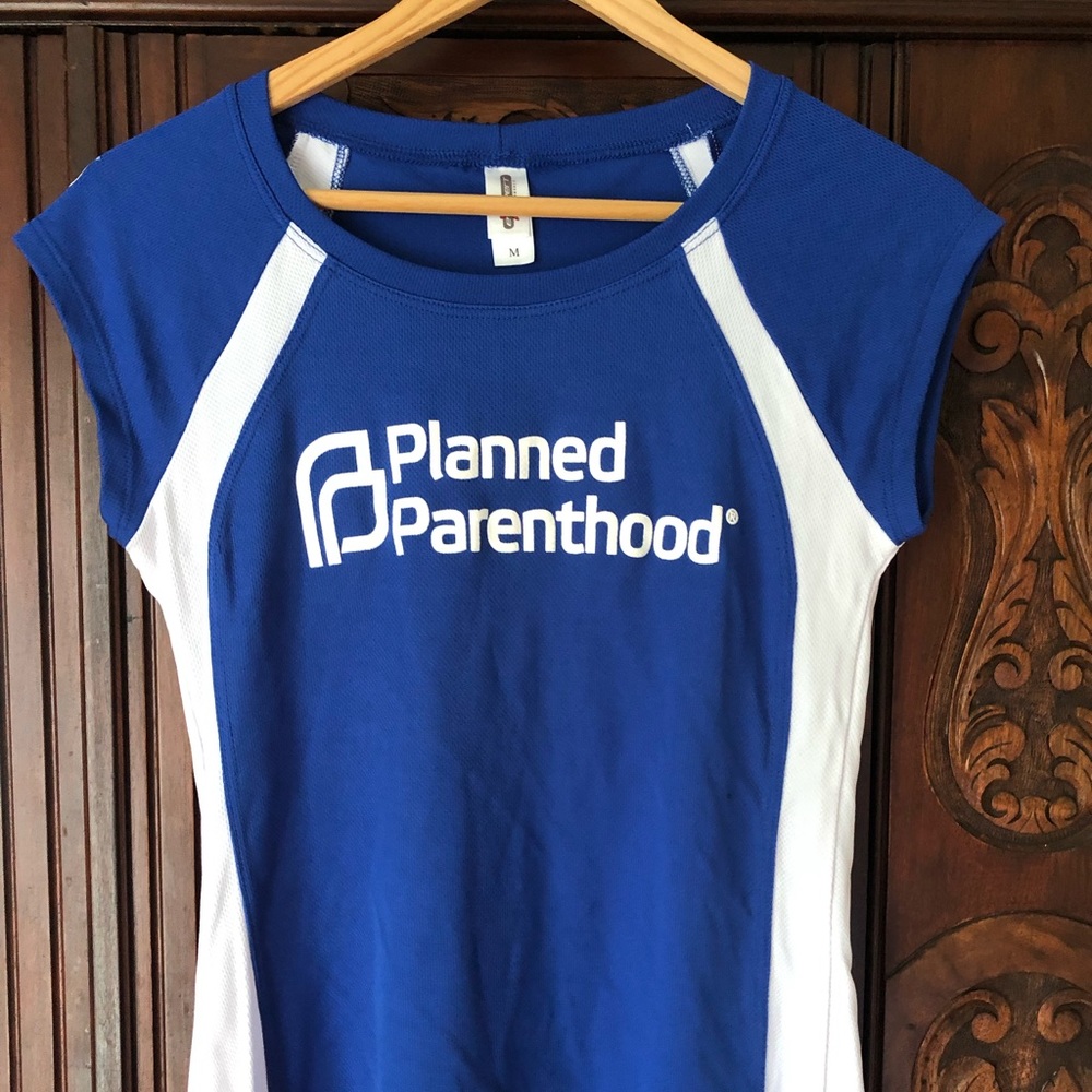 Planned Parenthood women’s athletic top. Never worn.